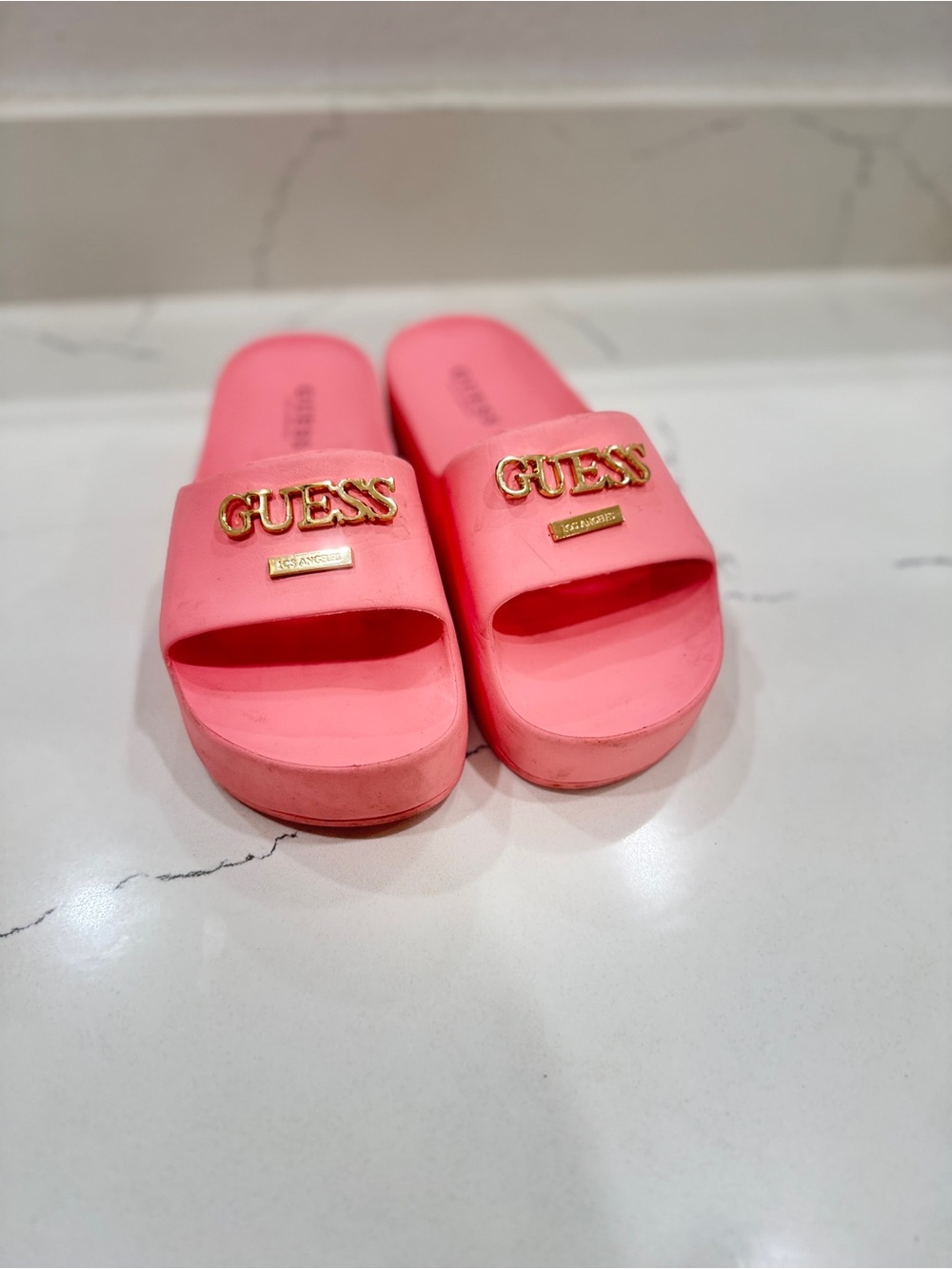 GUESS Coral Pink Slide Sandals with Gold Logo Accent